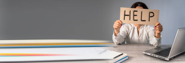 istock Tired woman with help inscription 1494317655