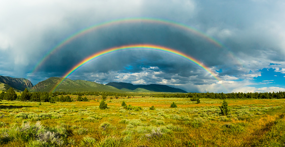 Beautiful Rainbow over South Steens Mountain Valley, Oregon, USA