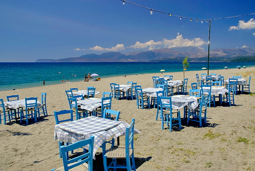 Kyrenia, North Cyprus - Restaurants at marina in Kyrenia (Girne) on May 17, 2014 in Kyrenia, North Cyprus. Kyrenia harbor is currently a tourist resort.