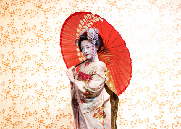 Japanese Maiko (Geisha in training) being photographed in studio