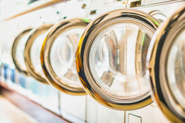 istock Washing machines in a public laundromat 1494320653