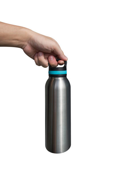 istock Hand holding stainless steel water bottle isolated on white background. 1494325019