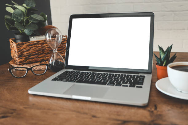 istock Laptop with isolated screen in home working environment 1494327555