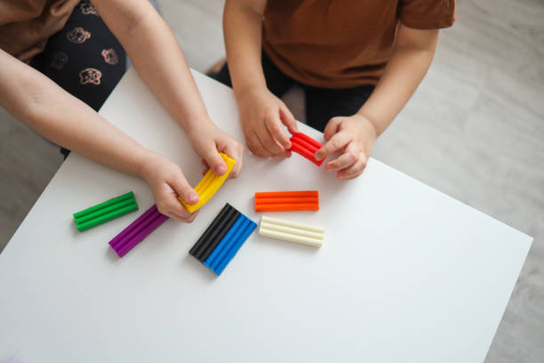 istock Children's hands modeling plasticine, top view, concept of creativity and education 1494327768