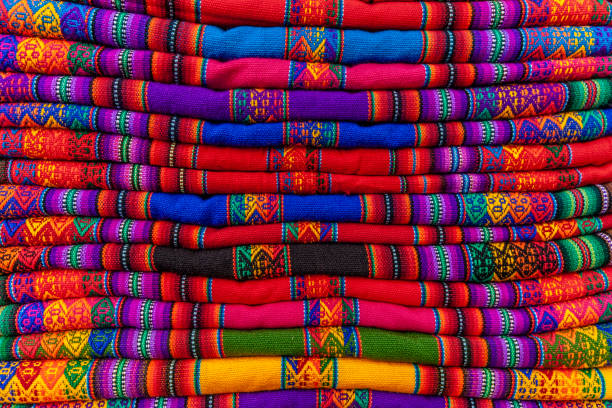 colorful peruvian fabrics, sacred valley of the incas - bedding merchandise market textile imagens e fotografias de stock