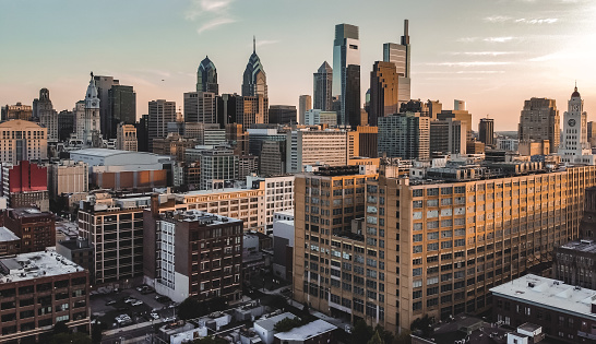 Drone footage of Philadelphia Skyscrapers during sunset on a beautiful day in the summer time in May