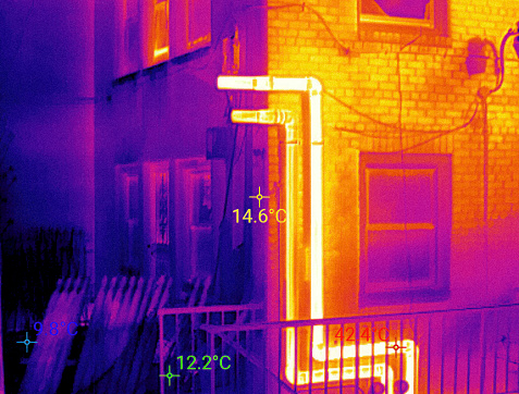 Lack of thermal insulation revealed by Infrared thermal imaging, prompting energy-efficient solutions.  Difference between Celsius temperature of house parts show the most emitted points