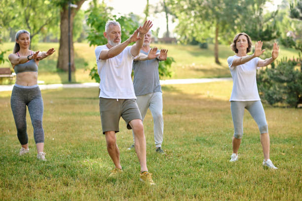 istock A group of people practicing qigong in a park 1494335560