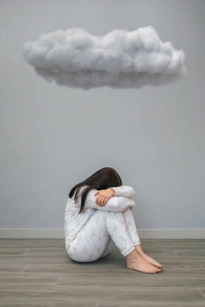 istock Woman with mental disorder and suicidal thoughts crying under a dark cloud 1494335703