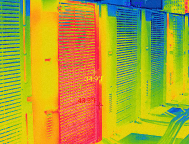 istock Fahrenheit temperature variety in different parts of split system on the building roof. Multicolored Infrared Thermal photo of Air Condition sets with cooling towers on the rooftop. 1494335969