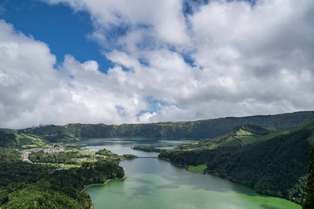 istock Tranquil Lake in a Forested Landscape 1494337311