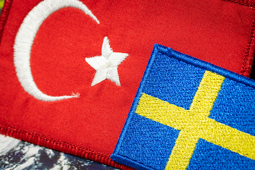 Flags of Turkey and Sweden, Conflict of both countries over the Kurds, Turkey's disagreement with Sweden's desire to join a joint military alliance.