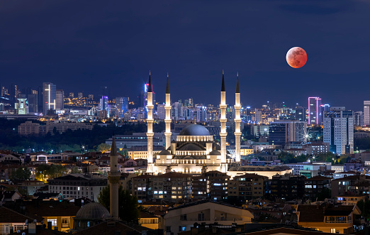 Wonderful night view long exposure of  kocatepe mosque in Ankara and blood moon