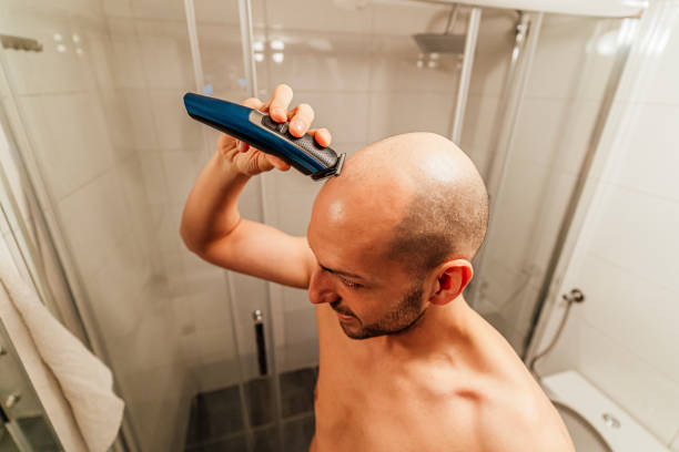 istock Man getting a self haircut at home 1494343919