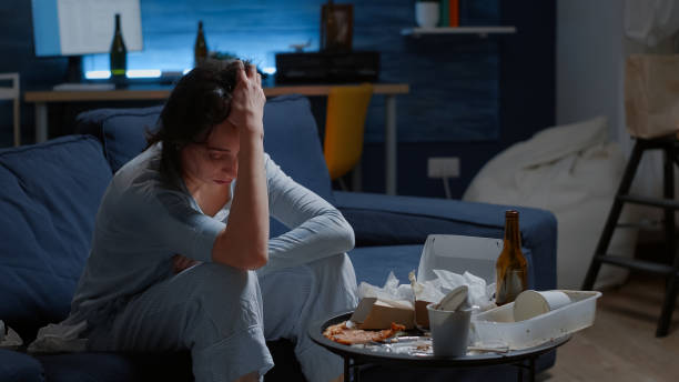 istock Frustrated stressed woman having headache feeling sad depressed 1494344176