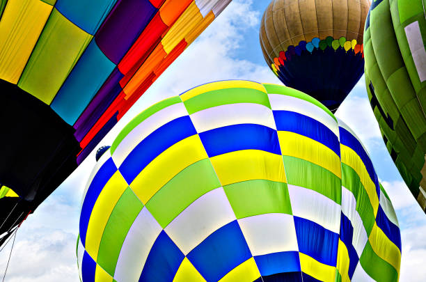 istock Hot air balloon flight over blue sky 1494344508