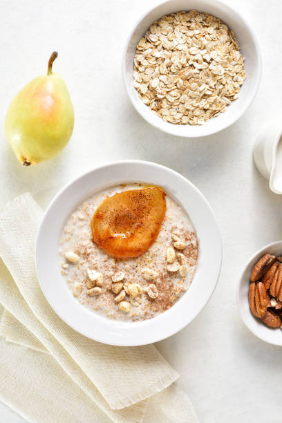 istock Oat porridge with caramelized pear and peanut 1494344739