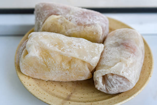 istock Stuffed cabbage in a bowl. Frozen semi-finished product is defrosted before cooking. 1494345534