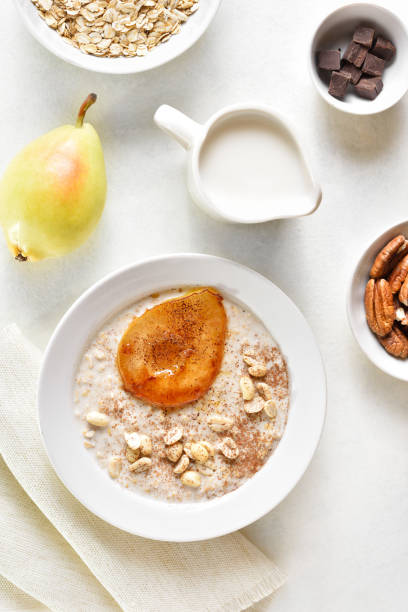 istock Oat porridge with caramelized pear and peanut 1494345583