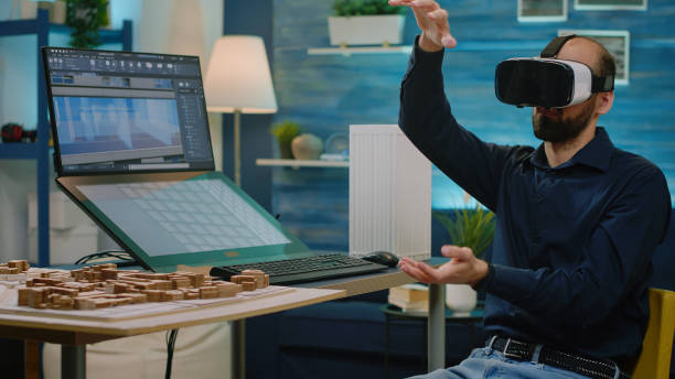 istock Man engineer working with vr glasses to design building model 1494347384