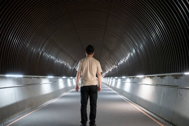 Men are active in a tunnel with a sense of modern technology