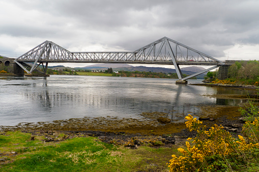The Connel Bridge at the falls of Lora is situated some six miles North East of Oban on the West Coast of Scotland.\n\nThe \