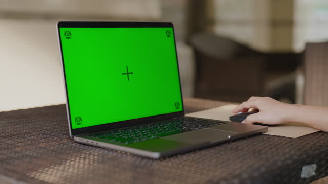 Chroma key green screen on the laptop