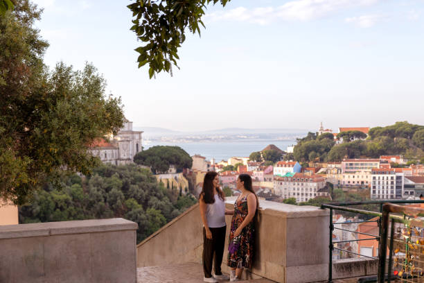istock Lesbian couple enjoying Lisbon belvedere view 1494353452