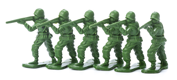 Plastic soldier figure on white background