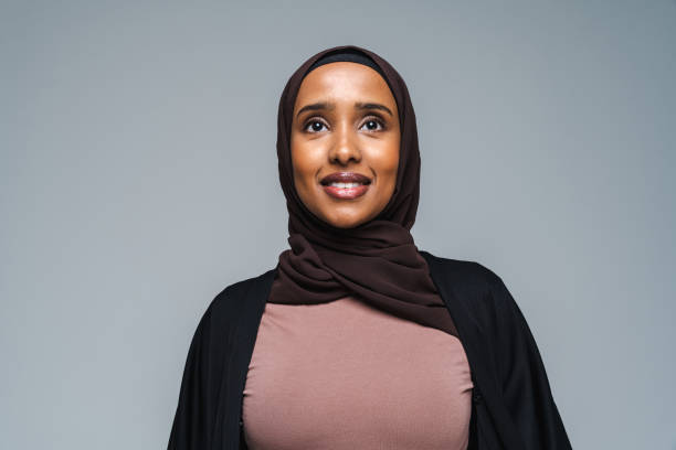 istock Beautiful arab middle-eastern woman with traditional abaya in studio 1494354894
