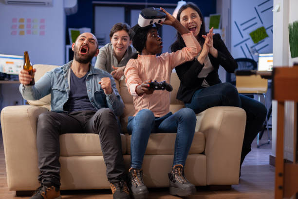 istock Diverse team of colleagues enjoy vr glasses experience 1494356060