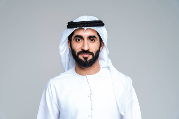 istock Handsome arab middle-eastern man with traditional kandora portrait in studio 1494356161