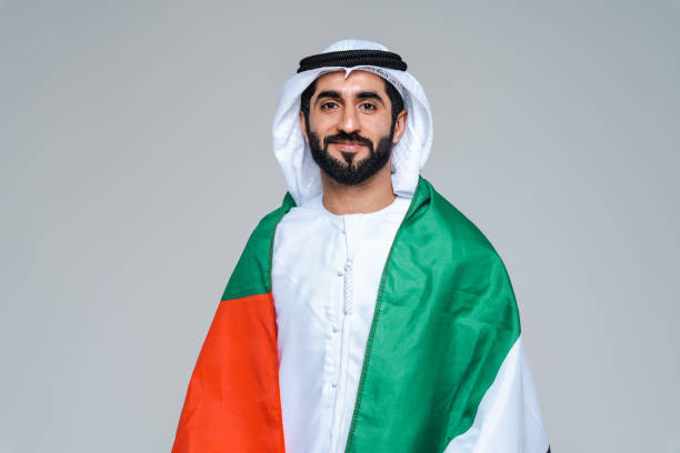 istock Handsome arab middle-eastern man with traditional kandora portrait in studio 1494356182