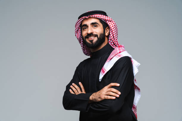 istock Handsome saudi arabian middle-eastern man with traditional thwab portrait in studio 1494356627
