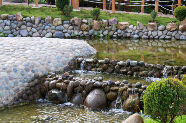 Pebbles, small white stones, the texture of the stone. Flower bed design