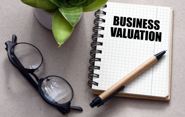 istock BUSINESS VALUATION words in an office notebook. 1494362775