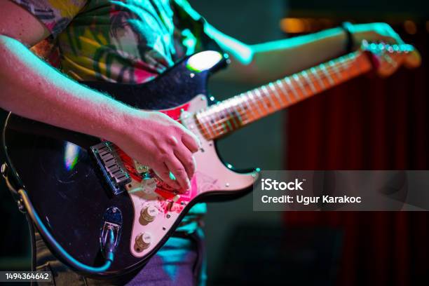 Musicians Tuning The Guitar On Stage Stock Photo - Download Image Now - Music Style, Close-up, Life Events