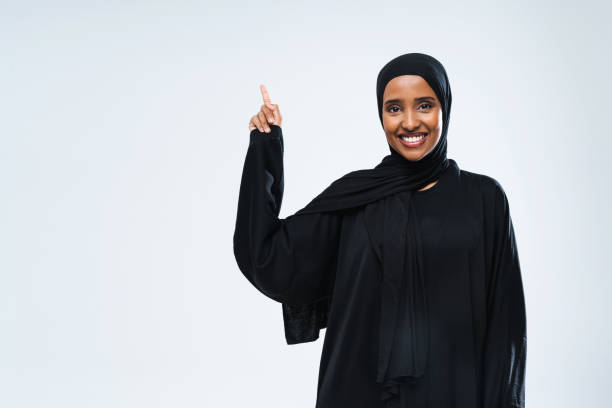 istock Beautiful arab middle-eastern woman with traditional abaya in studio 1494365171