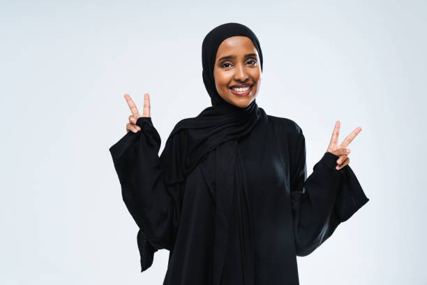 istock Beautiful arab middle-eastern woman with traditional abaya in studio 1494365808