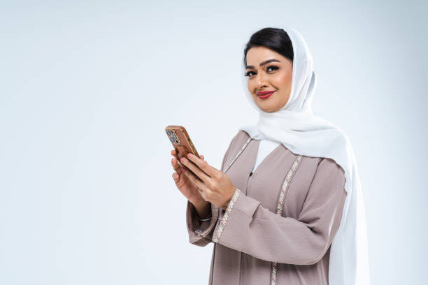 istock Beautiful arab middle-eastern woman with traditional abaya in studio 1494365972