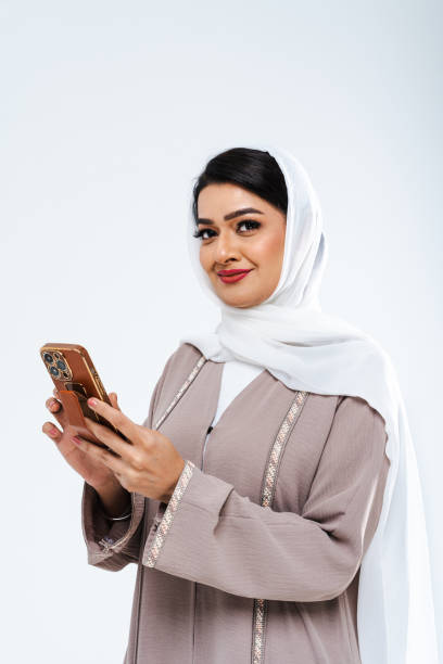 istock Beautiful arab middle-eastern woman with traditional abaya in studio 1494366145