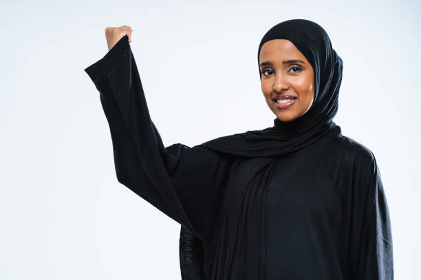 istock Beautiful arab middle-eastern woman with traditional abaya in studio 1494366305
