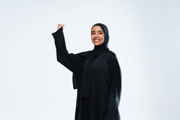 istock Beautiful arab middle-eastern woman with traditional abaya in studio 1494366476