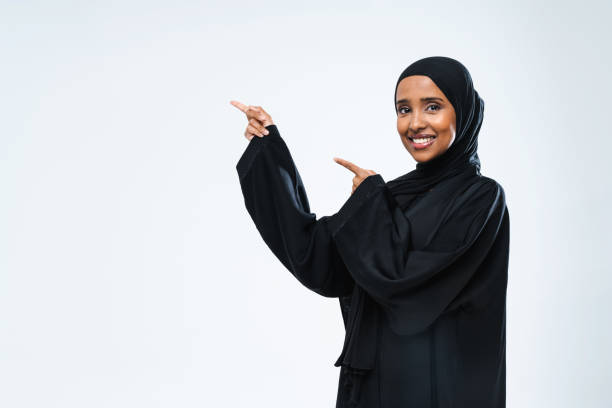 istock Beautiful arab middle-eastern woman with traditional abaya in studio 1494367093
