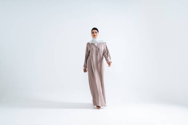 istock Beautiful arab middle-eastern woman with traditional abaya in studio 1494367979