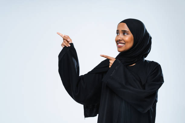 istock Beautiful arab middle-eastern woman with traditional abaya in studio 1494368007