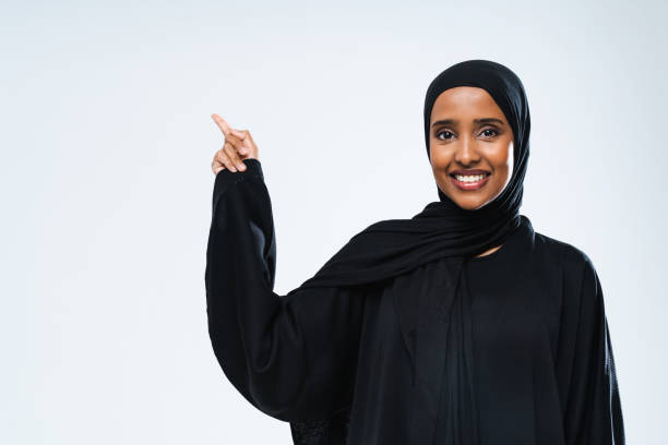 istock Beautiful arab middle-eastern woman with traditional abaya in studio 1494368131