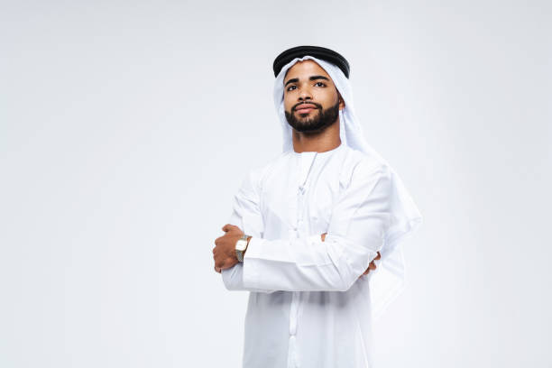 istock Handsome arab middle-eastern man with traditional kandora portrait in studio 1494368240