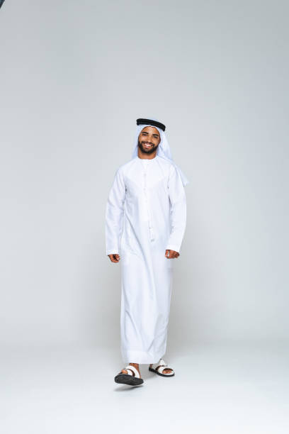 istock Handsome arab middle-eastern man with traditional kandora portrait in studio 1494368297
