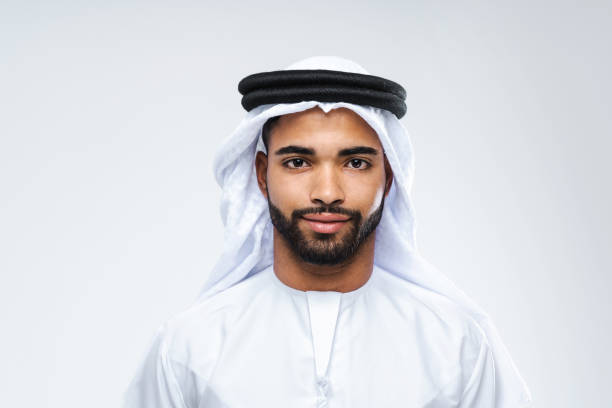 istock Handsome arab middle-eastern man with traditional kandora portrait in studio 1494368384
